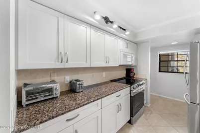 4100 Ocean Beach Boulevard #213, Cocoa Beach, FL 32931 - Photo 9