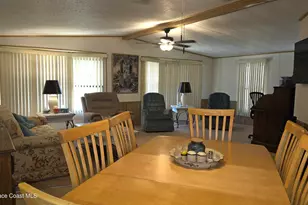 259 S Dolphin Cir, Barefoot Bay, FL 32976 - Photo 9
