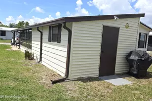 259 S Dolphin Cir, Barefoot Bay, FL 32976 - Photo 19