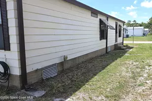 259 S Dolphin Cir, Barefoot Bay, FL 32976 - Photo 21