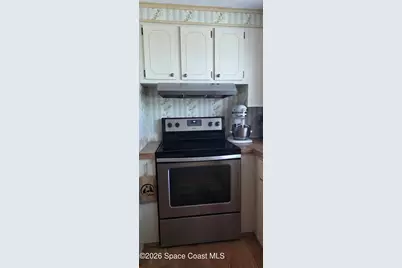 579 N Dolphin Circle, Barefoot Bay, FL 32976 - Photo 5