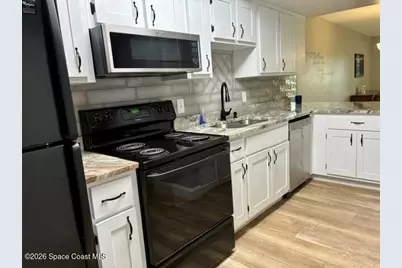 1010 Pine Tree Drive #202, Indian Harbour Beach, FL 32937 - Photo 5