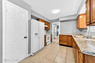 1295 Country Club Blvd, Titusville, FL 32780 - Photo 13