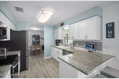 1035 Molaki Drive, Merritt Island, FL 32953 - Photo 17