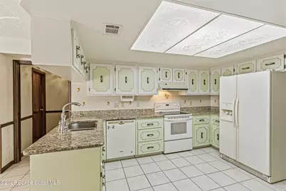 460 Neptune Drive NE, Melbourne, FL 32907 - Photo 27