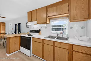886 Pecan Cir, Barefoot Bay, FL 32976 - Photo 11