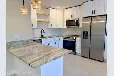 909 S Colonial Court #C, Indian Harbour Beach, FL 32937 - Photo 5