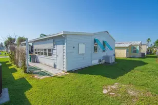 836 Hyacinth Cir, Barefoot Bay, FL 32976 - Photo 29