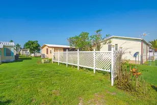 836 Hyacinth Cir, Barefoot Bay, FL 32976 - Photo 31