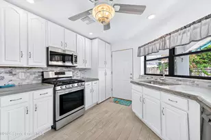 237 NE 1st St, Satellite Beach, FL 32937 - Photo 17