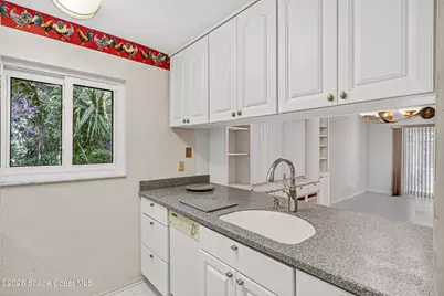 8702 Hibiscus Court, Cape Canaveral, FL 32920 - Photo 11
