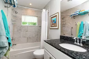 1052 Pine Tree Dr, Indian Harbour Beach, FL 32937 - Photo 11