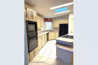 1202 Calusa Drive, Barefoot Bay, FL 32976 - Photo 5