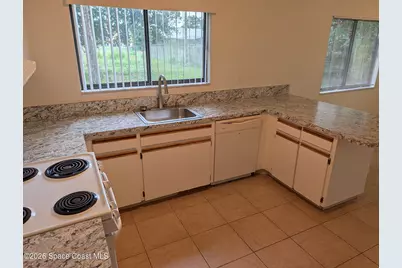 1257 NW Lamplighter Drive NW, Palm Bay, FL 32907 - Photo 3
