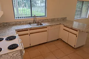 1257 NW Lamplighter Dr NW, Palm Bay, FL 32907 - Photo 3