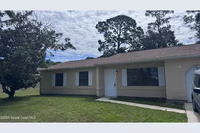 1257 NW Lamplighter Drive NW, Palm Bay, FL 32907 - Photo 1