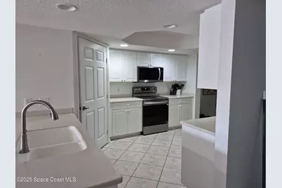 8921 Lake Drive #304, Cape Canaveral, FL 32920 - Photo 13
