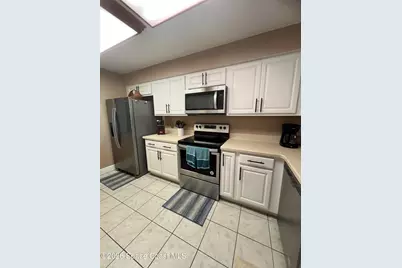 1050 N Atlantic Avenue #106, Cocoa Beach, FL 32931 - Photo 9