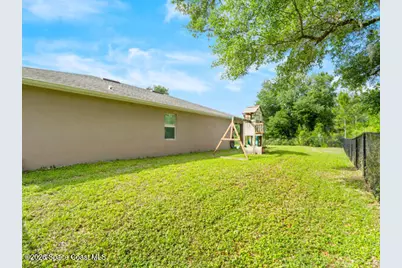 1261 Rainbow Road SE, Palm Bay, FL 32909 - Photo 7