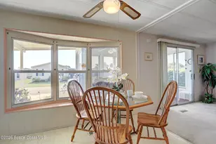 912 Oriole Cir, Barefoot Bay, FL 32976 - Photo 7