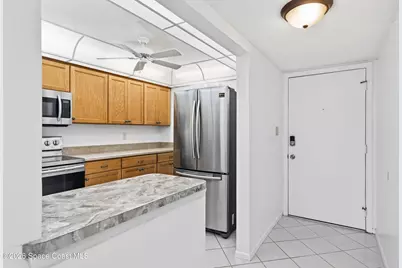 500 Palm Springs Boulevard #407, Indian Harbour Beach, FL 32937 - Photo 5