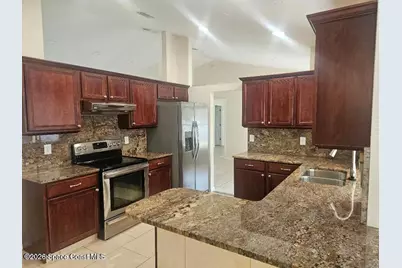 1040 Big Horn Circle NW, Palm Bay, FL 32907 - Photo 3