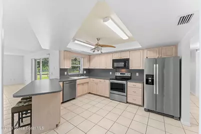 1512 Meadowbrook Road NE, Palm Bay, FL 32905 - Photo 17