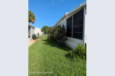1009 Buttonwood Street, Barefoot Bay, FL 32976 - Photo 3