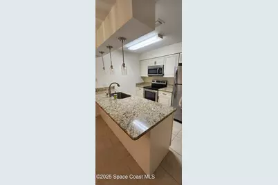 8708 Jasmine Court, Cape Canaveral, FL 32920 - Photo 33