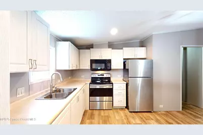 709 Lark Drive, Barefoot Bay, FL 32976 - Photo 13