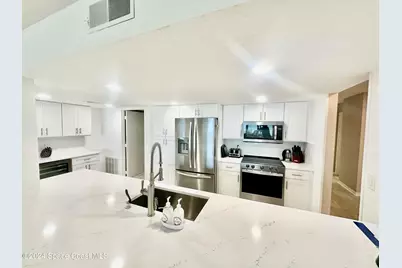 6770 Ridgewood Avenue #1103, Cocoa Beach, FL 32931 - Photo 5