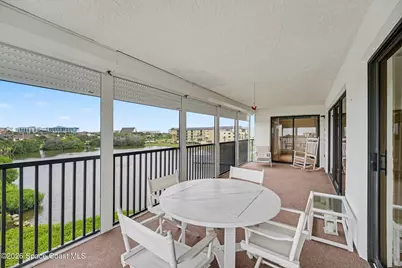 3613 S Banana River Boulevard #D401, Cocoa Beach, FL 32931 - Photo 1