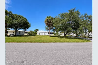 401 Eagle Drive, Barefoot Bay, FL 32976 - Photo 1