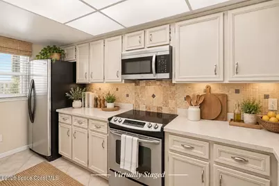 1890 N Atlantic Avenue #A205, Cocoa Beach, FL 32931 - Photo 21