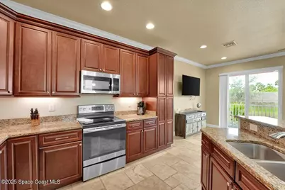 211 Ivory Coral Lane #104, Merritt Island, FL 32953 - Photo 13