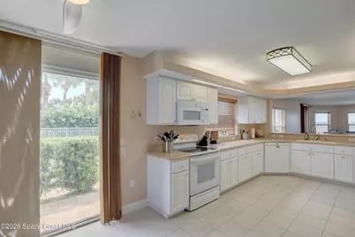 3360 S Atlantic Avenue #105, Cocoa Beach, FL 32931 - Photo 17