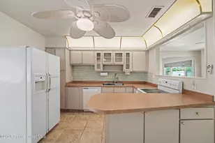 150 W Volusia Ln, Cocoa Beach, FL 32931 - Photo 11