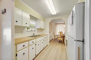 908 Thrush Cir, Barefoot Bay, FL 32976 - Photo 9