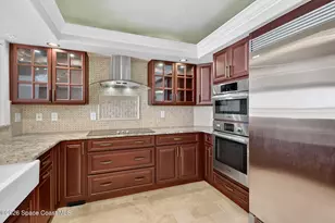 8934 Puerto Del Rio Dr, Cape Canaveral, FL 32920 - Photo 11