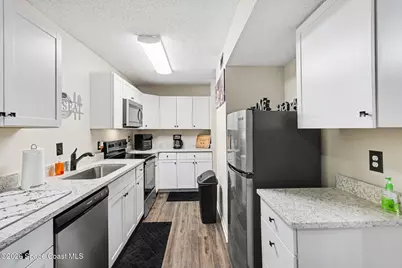 3595 Sable Palm Lane #J, Titusville, FL 32780 - Photo 7