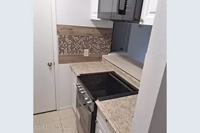 225 S Tropical Trail #Unit 404, Merritt Island, FL 32952 - Photo 5