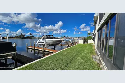 205 S Banana River Boulevard #202, Cocoa Beach, FL 32931 - Photo 1