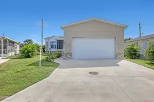 879 Laurel Cir, Barefoot Bay, FL 32976 - Photo 1