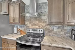 879 Laurel Cir, Barefoot Bay, FL 32976 - Photo 19