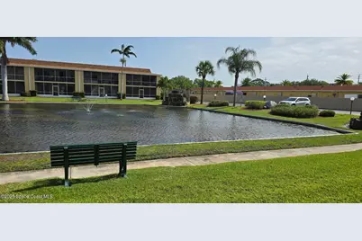 2135 N Courtenay Parkway #104, Merritt Island, FL 32953 - Photo 1