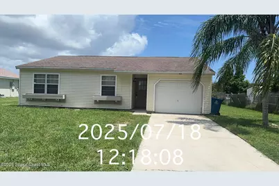1015 Grandeur Street SE, Palm Bay, FL 32909 - Photo 1