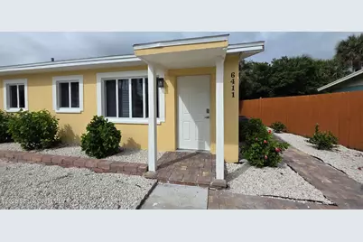 6411 Ridgewood Avenue, Cocoa Beach, FL 32931 - Photo 1