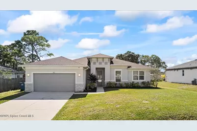 1810 NW Calmar Street NW, Palm Bay, FL 32907 - Photo 1