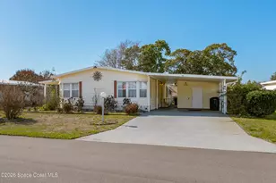 917 Cypress St, Barefoot Bay, FL 32976 - Photo 1