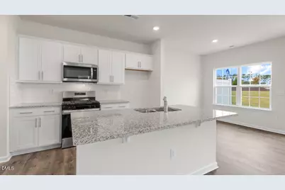 7142 Royal Ascot Drive, Whitsett, NC 27377 - Photo 9